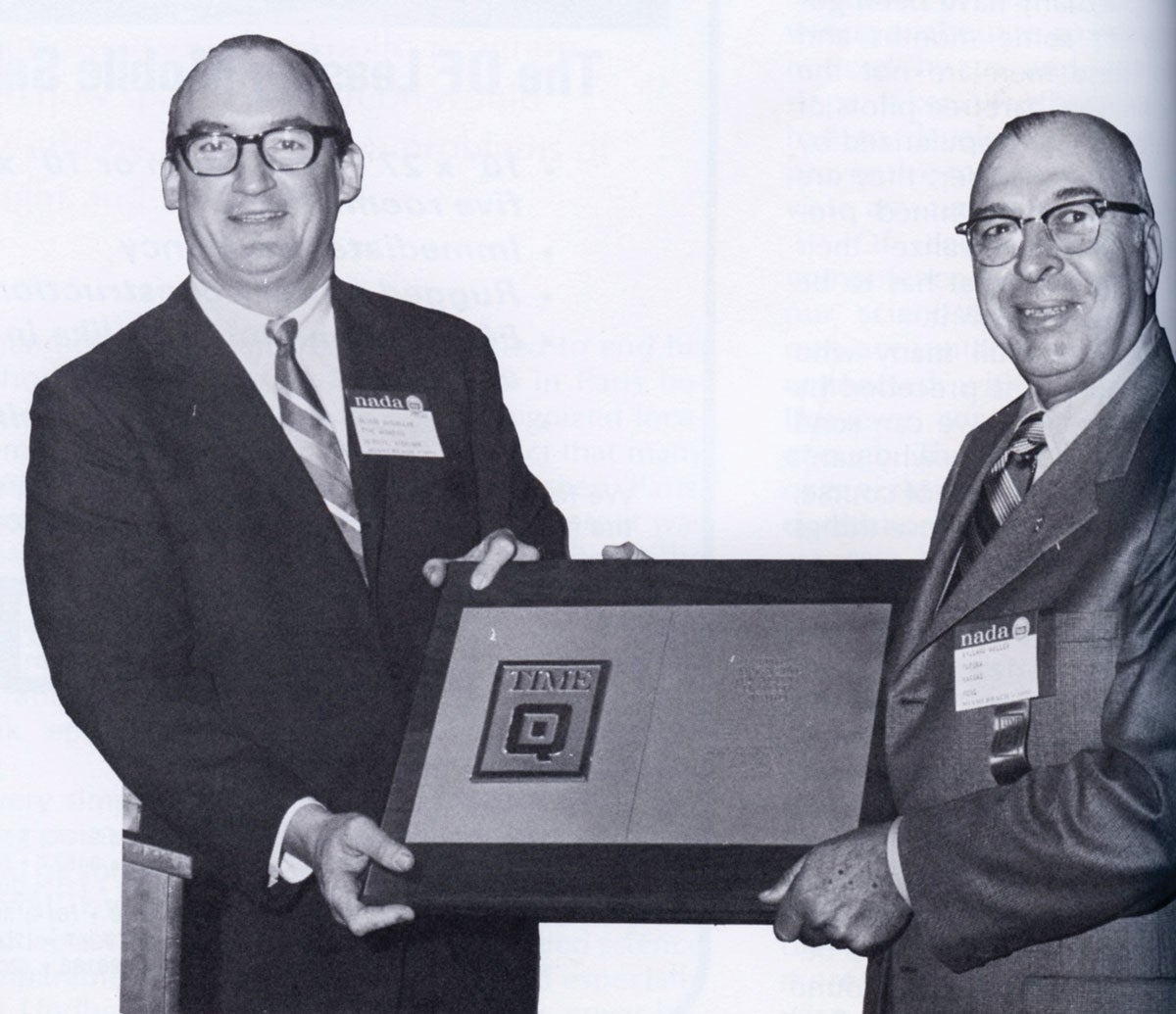 The first TIME award winner: Ford dealer O. Willard Noller of Topeka, Kan. (right) with TIME’s George W. McClellan, in 1970.