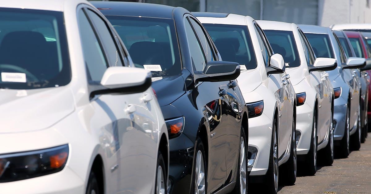 Cars lined up on dealership lot