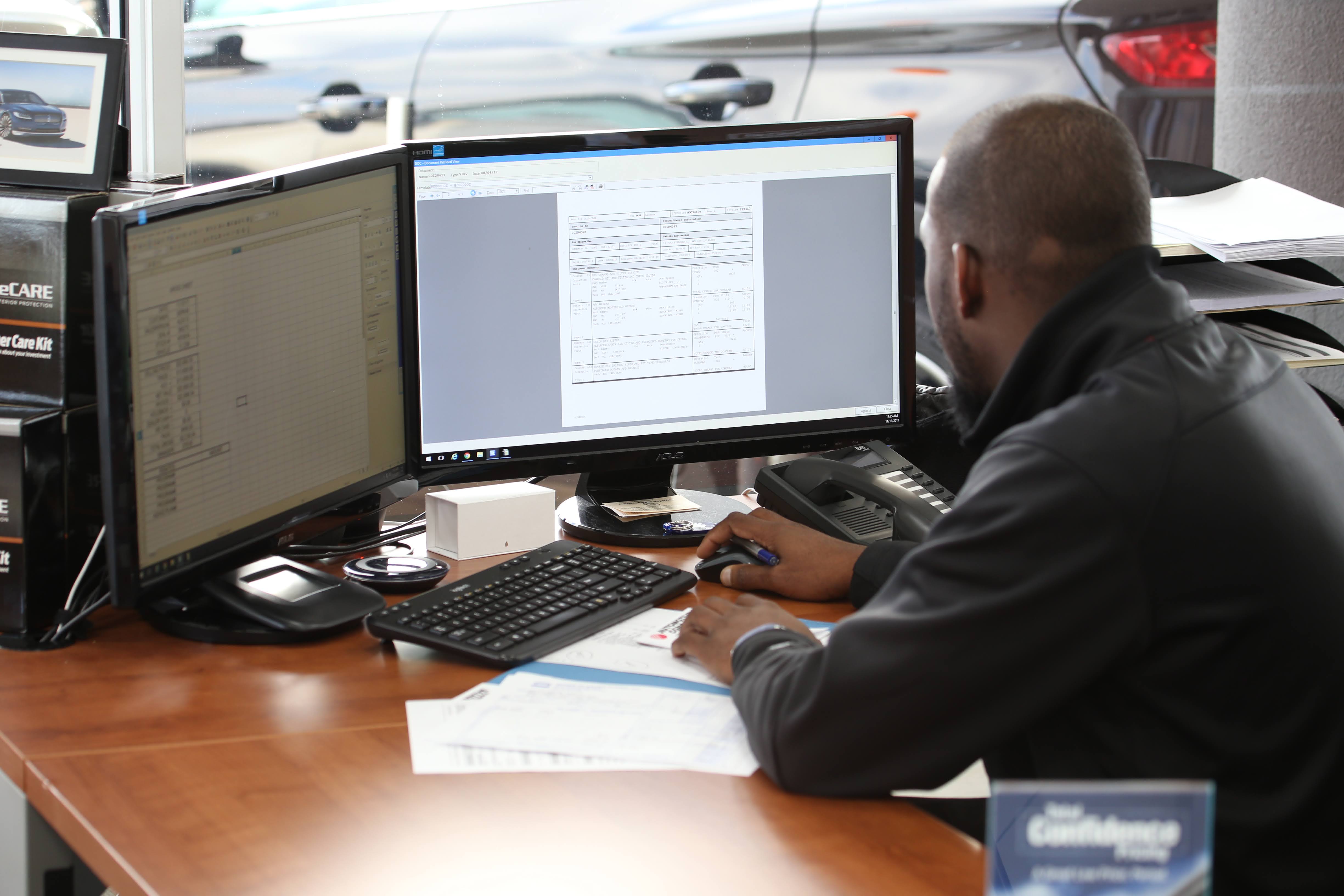 Dealership – Person at desk