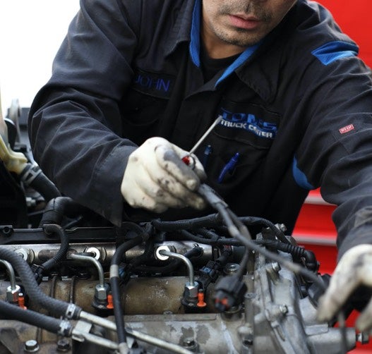 Person working on a vehicle