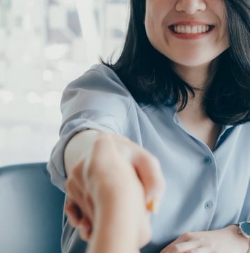 Woman shaking hands